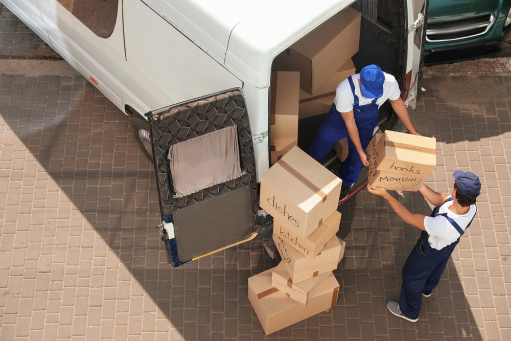 Removalists Putting Boxes In Truck — Removalist in Brisbane, QLD